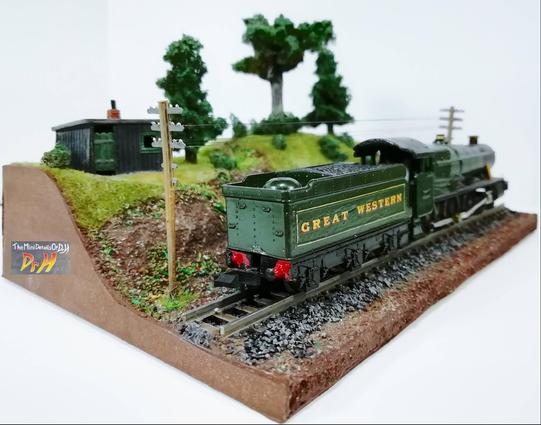 Model train display base, with train. corner view.