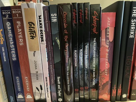 ttrpg books includinng glitch, sin, yazeba's and some other stuff