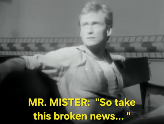 Still from the video of the Mr. Mister song "Broken Wings".

A caption has been added to suggest the lyrics include, "So take this beoken news... "