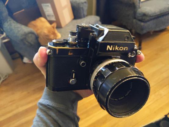 A black Nikon F2 with metered prism and macro lens.