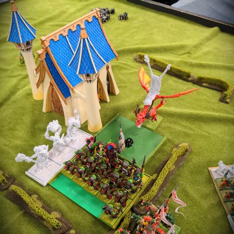 A High elf Manor besieged by an orc army, The elven general makes a valiant last stand to defend his home as the (literal and metaphorical) cavalry arrive in an attempt to drive off the orcs. Sadly it was not to be and in the final turn the elven general was viciously slain by the Black orc warboss.