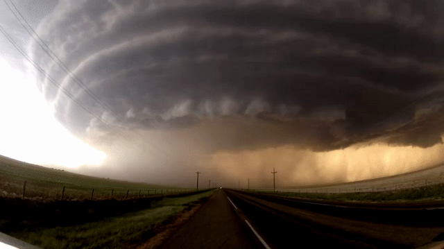 Animated GIF loop of a supercell moving slowly towards the camera.