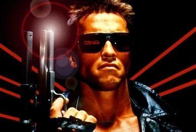 Arnold Schwarzenegger as the eponymous “Terminator” (1984), a muscle-bound behemoth of a man, clad in leather jacket and sunglasses, holding an oversized handgun.