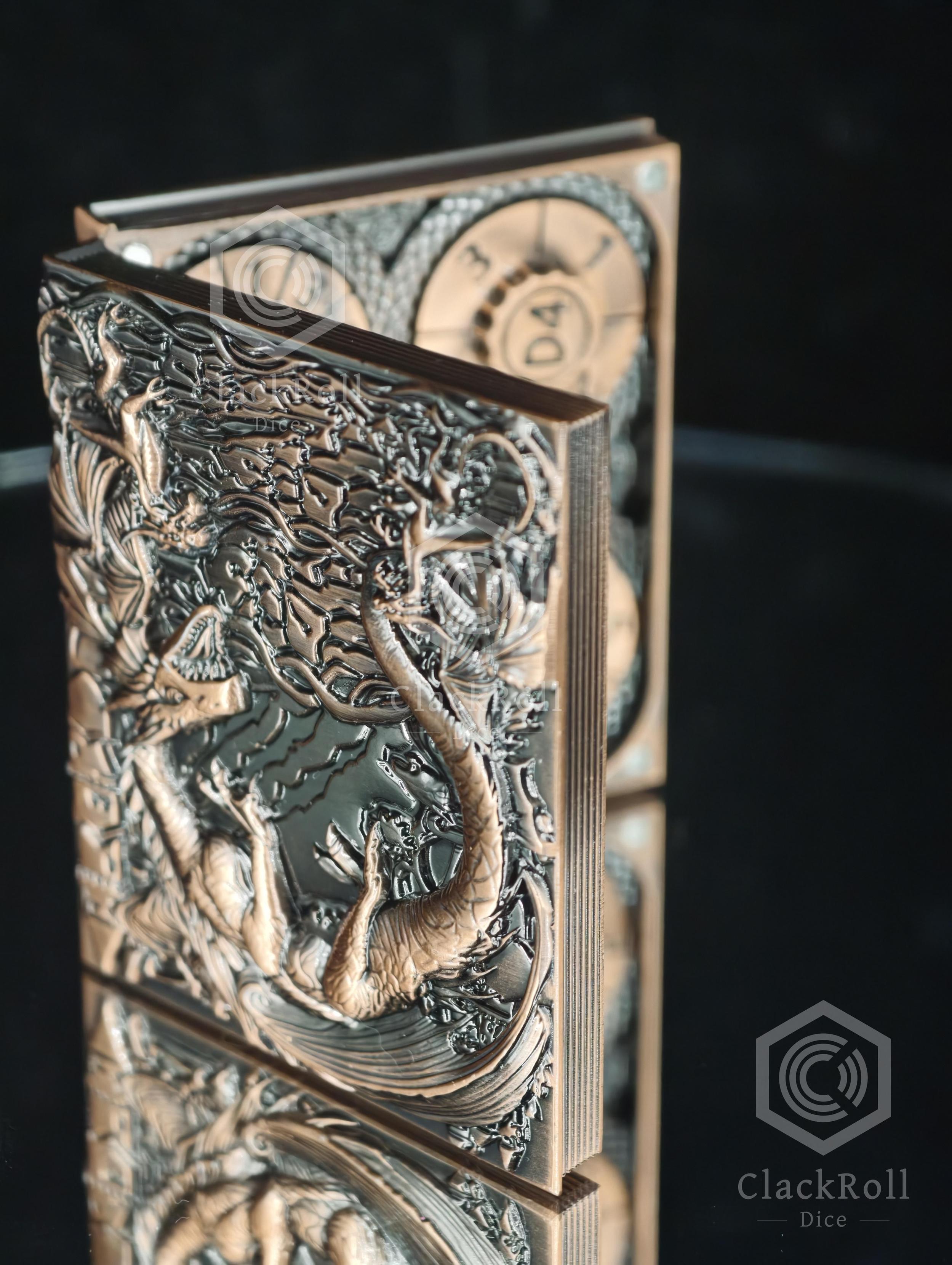 ClackRoll Bronze Tome 7-in-1 metal gear-dial dice book. Features a weathered, antiqued bronze hinged case with an intricate, high-relief dragon carving on the cover, reflecting on a dark glassy surface.