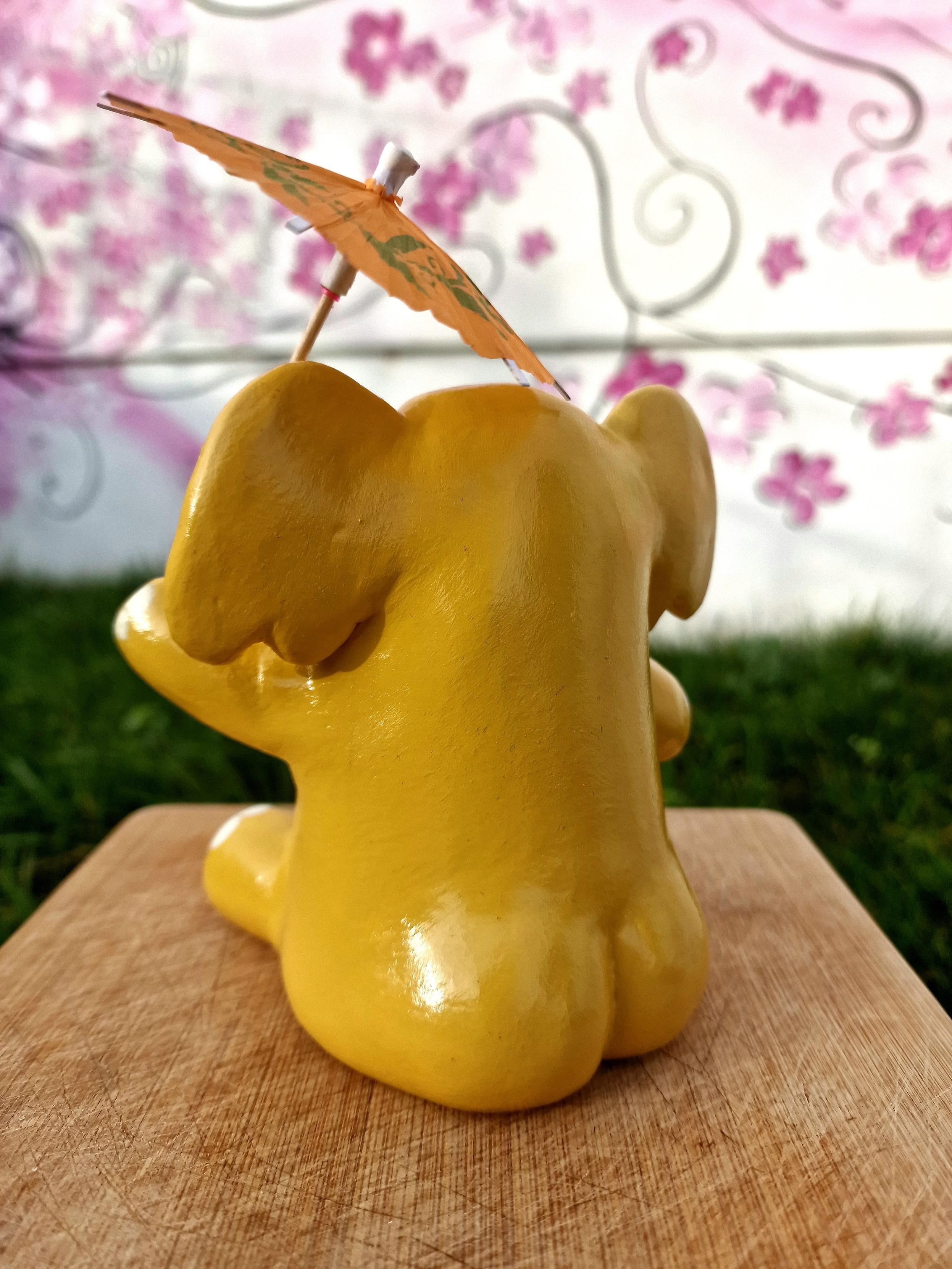 The ornament from behind, showing off his immense gleaming bum cheeks