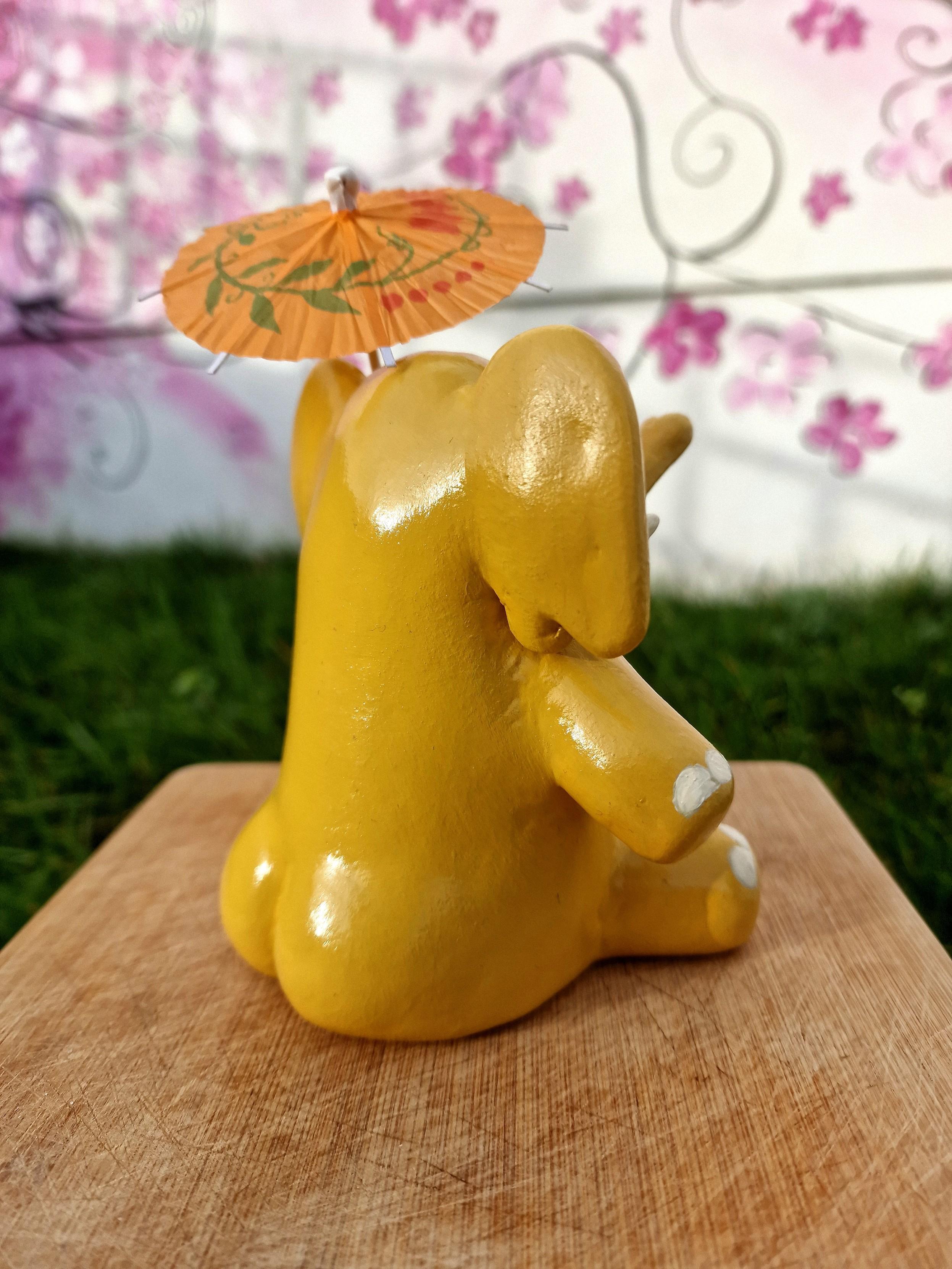 The ornament from behind, showing off his immense gleaming bum cheeks