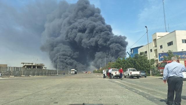 picture of the fire at Bandar Abbas port after the explosion earlier today