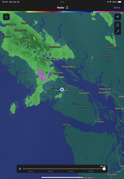 A radar image shows green rain showers over the north east parts of Vancouver Island.