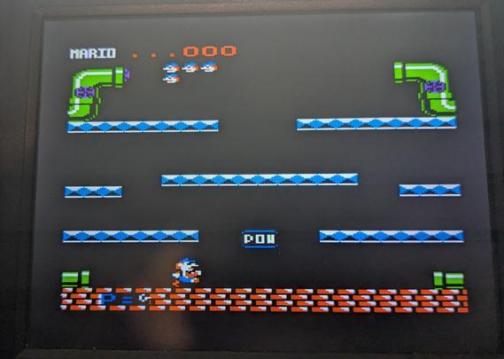 Mario Bros video game, a platformer for 8 but computers and game consoles. This version is for the Apple II, image and colors are crisp.