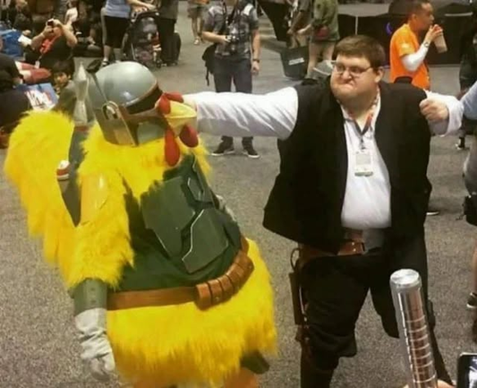 Heavy-set dude in a Han Solo outfit having a fist fight with a guy in a chicken, Boba Fett costume. Live Photo from some convention.