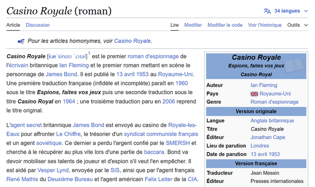 Capture d'écran de l'article Wikipédia sur le roman Casino Royale de Ian Fleming. Le texte présente des informations sur l'auteur, la date de publication (13 avril 1953) et les traductions françaises. L'article détaille l'intrigue du roman, où James Bond affronte Le Chiffre dans un casino, aidé par Vesper Lynd, René Mathis et Felix Leiter. Un encadré à droite affiche des données supplémentaires sur le livre, notamment sa langue originale (anglais britannique) et son éditeur (Jonathan Cape).