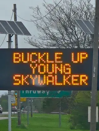 highway sign: buckle up young skywalker