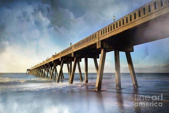 Foggy morning at Johnnie Mercer Pier in Wrightsville Beach, NC, with soft hues of sunrise over the Atlantic Ocean, showcasing a serene coastal landscape. From the Fine Art Gallery of Shelia-Hunt.pixels.com