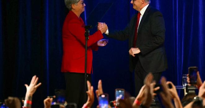 Australia's Foreign Minister Penny Wong (L) with Australia's Prime Minister Anthony Albanese after he won the general election in Sydney, May 3, 2025.