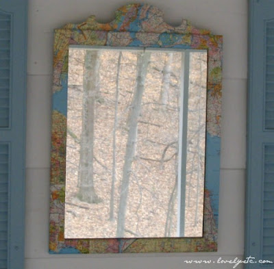 A mirror with the frame showing a map