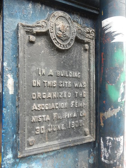 Photo of a 1955 Philippines Historical Committee marker with the following inscription:

In a building on this site was organized the Asociacion Feminista Filipinas on 30 June, 1905.