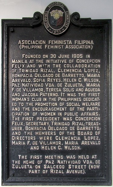 Photo of a 1955 Philippines Historical Committee marker with the following inscription:

Asociacion Feminista Filipina
(Philippine Feminist Association)

Founded on 30 June 1905 in Manila at the initiative of Concepcion Felix and with the collaboration of Trinidad Rizal, Clemencia Lopez, Bonifacia Delgado de Barretto, Maria Arevalo, Sofia Reyes, Helen C. Wilson, Paz Natividad Vda. de Zulueta, Maria F. de Villamor, Teresa Solis and Agueda and Jacoba Paterno. It was the first woman’s club in the …