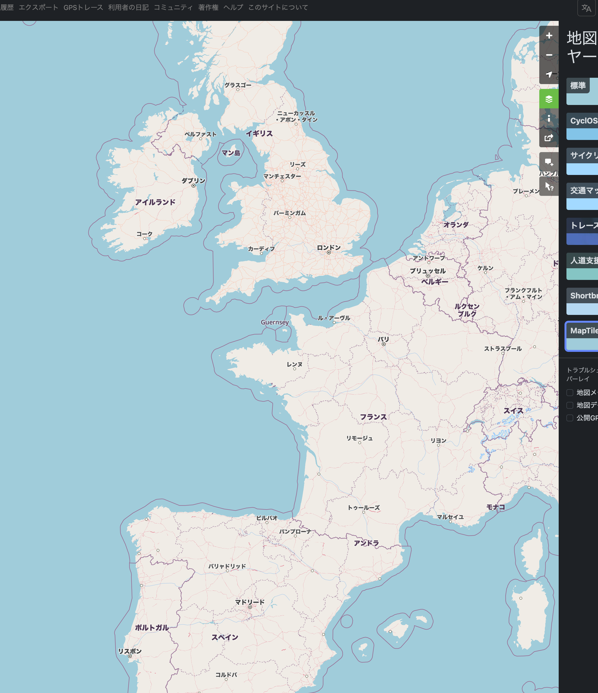 Screenshot of the www.openstreetmap.org website with the MapTiler OMT vector tile layer selected with the website and map displaying in Japanese. The map is displaying Western Europe with country and capitals displayed in Japanese characters.