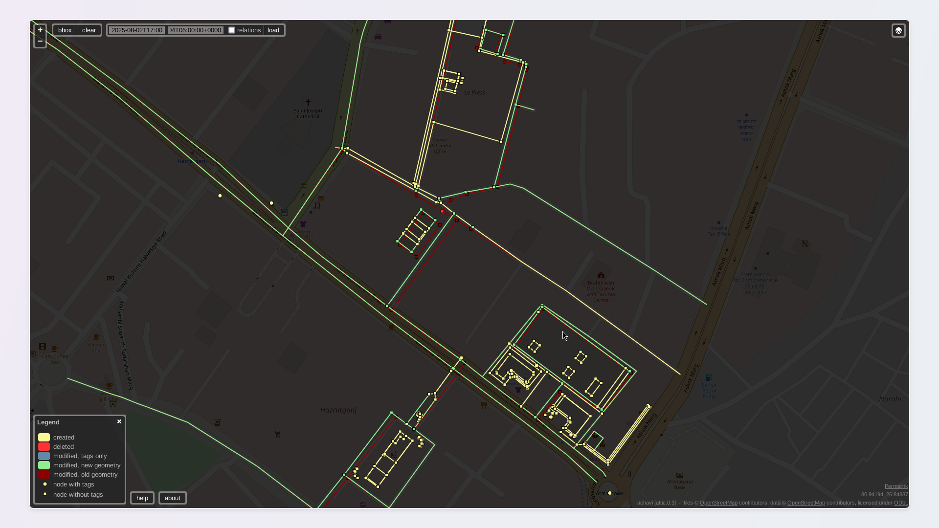 A screenshot of Achavi, showing changes as colored points, lines, and polygons on a darkened map.
The main road of the Hazratganj market runs diagonally down the map, from the northwest to the southeast. It's highlighted in green because of changes to its geometry.
On the southwest side, the central building and its building parts have been added and are highlighted in yellow. Benches and bleachers around it have been added. These were part of the preparatory survey made on Saturday evening, with a focus on places where 8-10 people could be seated together.
To the northeast of the Hazratganj main road, two buildings, six building parts, and three corridors and colonnades were added, highlighted in yellow. These colonnades were crucial to permit mapping in the rain without getting wet. Points of interest were also added in these buildings, shown as circular yellow points.
The Le Press area - where the participants went for dinner afterwards - was added, and is shown as a yellow polygon. Other yellow polygons within it indicate the addition of a building, outdoor seating, restaurant, and a parking lot. Part of the road outside it has been converted to dual carriageway. A screenshot of Achavi, showing changes as colored points, lines, and polygons on a darkened map.
The main road of the Hazratganj market runs diagonally down the map, from the northwest to the southeast. It's highlighted in green because of changes to its geometry.
On the southwest side, the central building and its building parts have been added and are highlighted in yellow. Benches and bleachers around it have been added. These were part of the preparatory survey made on Saturday evening, with a focus on places where 8-10 people could be seated together.
To the northeast of the Hazratganj main road, two buildings, six building parts, and three corridors and colonnades were added, highlighted in yellow. These colonnades were crucial to permit mapping in the rain without getting wet. Points of interest were also added in these buildings, shown as circular yellow points.
The Le Press area - where the participants went for dinner afterwards - was added, and is shown as a yellow polygon. Other yellow polygons within it indicate the addition of a building, outdoor seating, restaurant, and a parking lot. Part of the road outside it has been converted to dual carriageway.