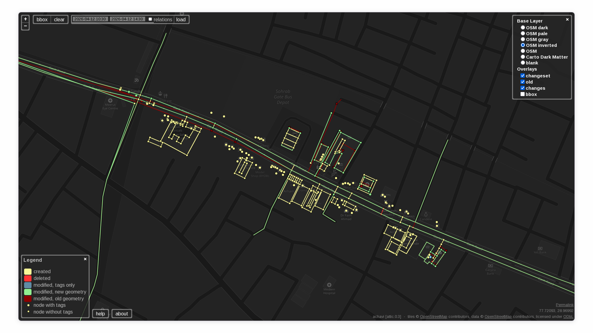 Screenshot of Achavi, showing the changes made during the mapping party along Garh Road, Meerut as colored shapes against a dark OpenStreetMap background.

The mappers moved northwest of Haldiram's as they mapped along Garh Road, until they reached Gandhi Ashram Chowk. The changes reflect this itinerary.

Both carriageways of Garh Road as well as a few roads branching off of them are highlighted in green, indicating changes to geometry. There are many clusters of yellow polygons and points along the road, indicating newly-mapped buildings and shops. A few buildings are also highlighted in green with earlier versions in red, indicating changes to geometry.