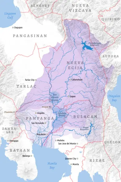Map showing the Pampanga River basin / watershed in central Luzon in the Philippines flowing south into Manila Bay. The map shows the island of Luzon in white with a subtle grayscale hillshaded topography covering the mountainous areas. Major rivers are drawn with tributaries in thinner blue lines and downstream rivers increasing in width while the watershed region is highlighted in translucent purple. Provincial borders are drawn in light translucent red with the provinces’ names in translucen…