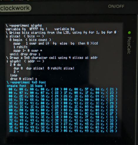 A screen of Forth text showing 32 lines of 64 characters each, in a rather chonky pixel font. The top half is in cream and the bottom half is in cyan.