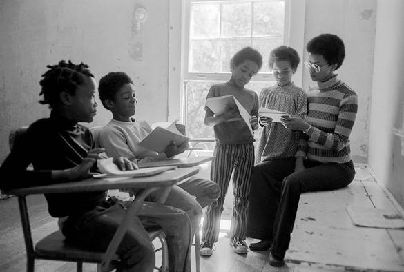 "Black Panther children in a classroom with their teacher, Evon Carter, widow of Alprentice Bunchy Carter, at the Intercommunal Youth Institute, the Black Panther school."