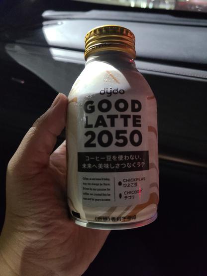 Can of Dydo "Good Latte 2050," a cream-colored can with a coffee-like drink containing chickpeas and chicory