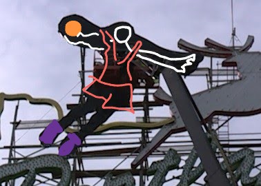The photo of the obscured addition to the Portland Oregon sign. I've quickly sketched over the shape to show what's depicted. It's a basketball player flying through the air with a basketball held by one arm behind the player and the other arm outstretched in front of it.