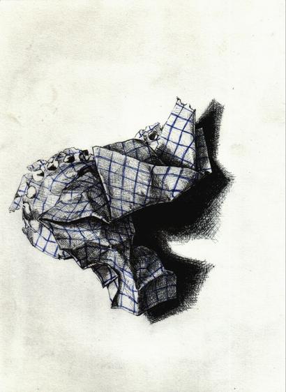 A ball of crumpled graph paper, fringe still running down one side as a result of the paper's having been torn out of a spiral notebook.
Everything but the grid, which is blue, drawn with a black ballpoint pen