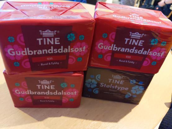 4kg of TINE Gudbrandsdalsost from Norway on a table at a FOSDEM fringe event