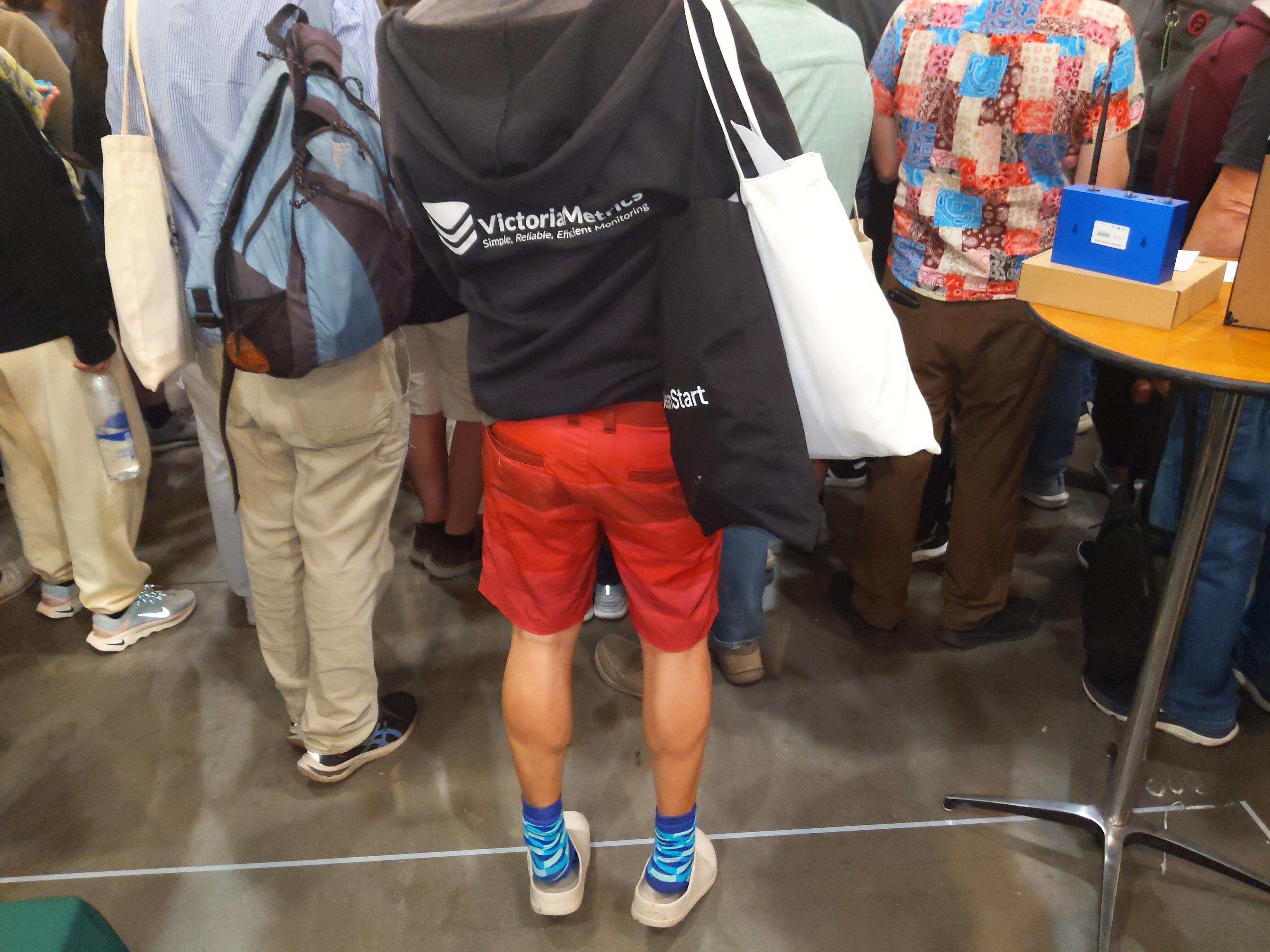 Microsoft gathers a crowd with a proprietary device lottery to make Software Freedom Conservancy booth blocked and inaccessible.