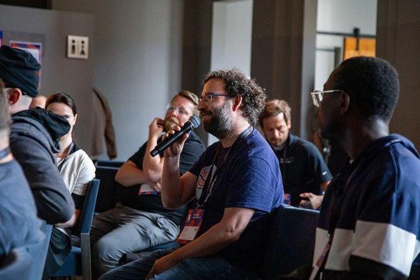 Attendees during a Q&A session