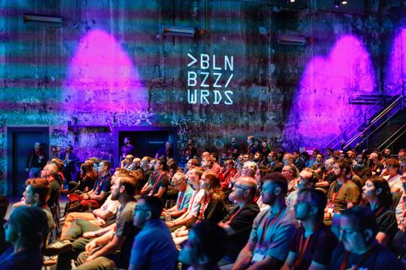 bbuzz attendees listening to a talk on stage