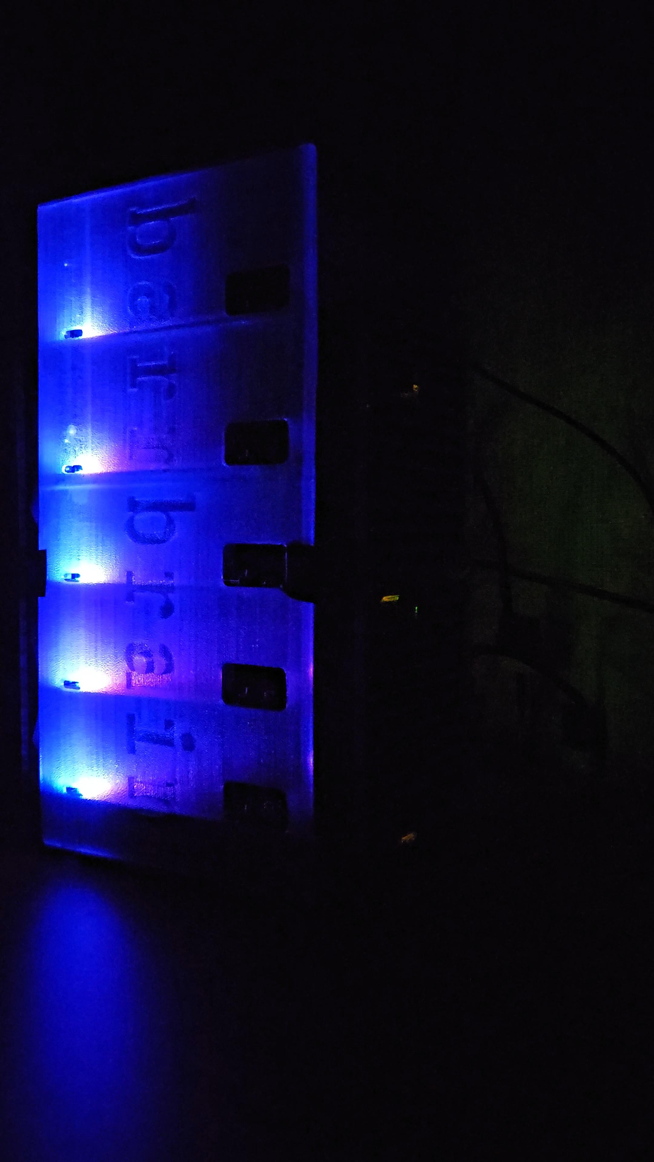 Power lights on each board of the mini tower brilliantly illuminate the front panel. The flicker of network status lights softly animates the wallpaper of the study.