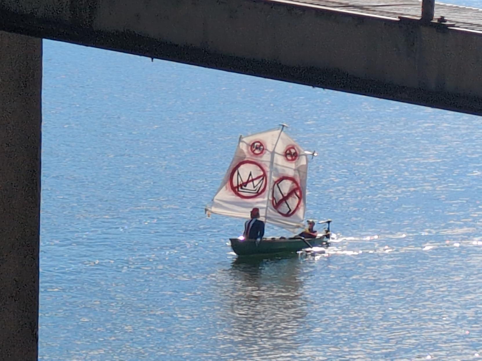 Small sailboat with no kings images on the sails