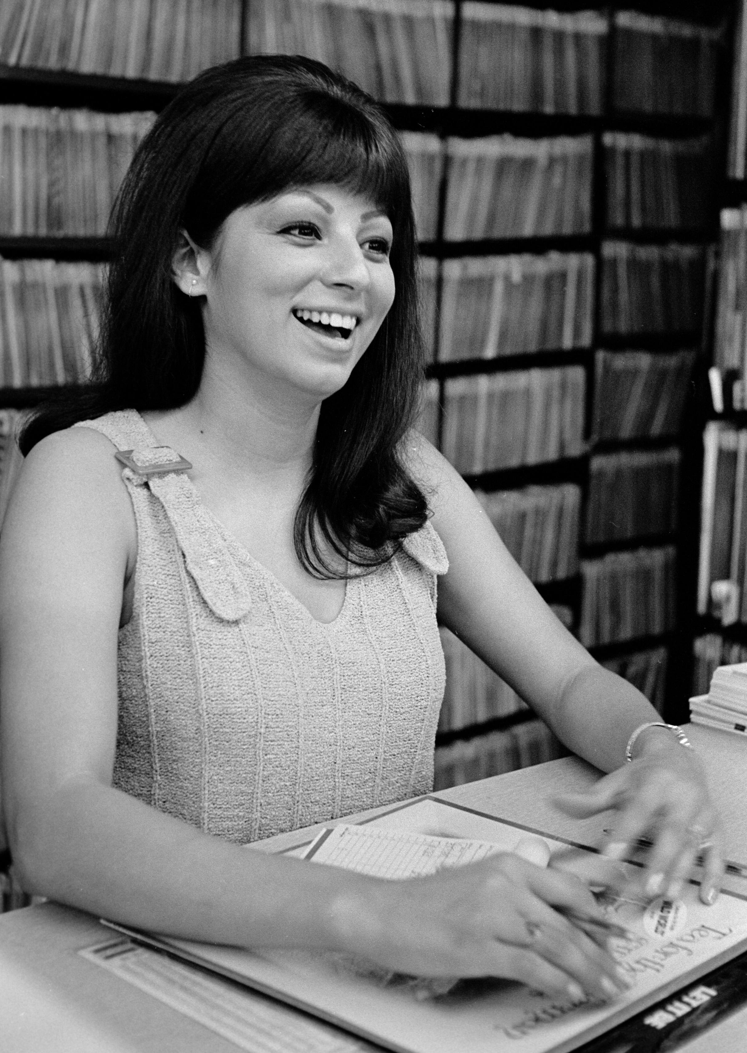 We are buying copies of Tea for the Tillerman (Cat Stevens) and Let it Be (Beatles), which puts this pretty firmly in 1970.