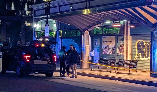 Cops at taped off crime scene, photo by Highguard