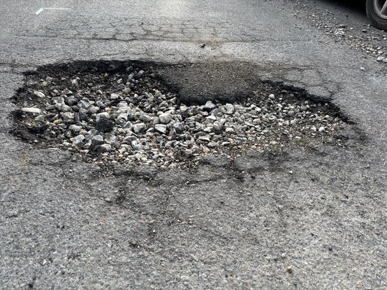 Another large pothole in a neighbouring street