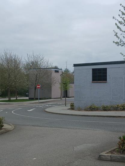Exterior of Bletchley Park, UK. Showing brick barrack style buildings.