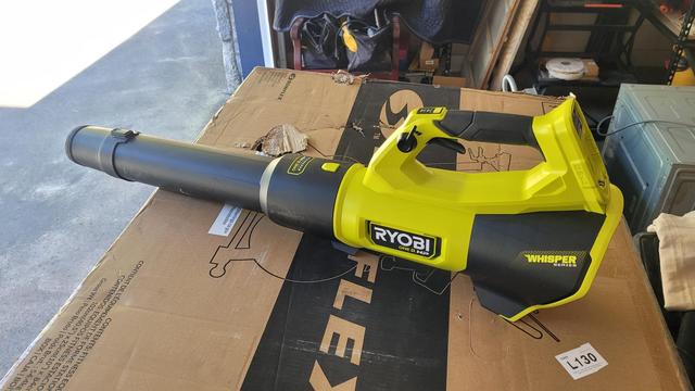 A photo of a Ryobi 510CFM electric leaf blower.