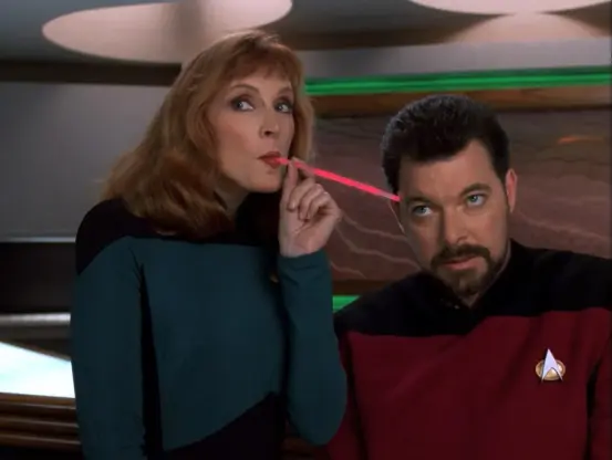 Screenshot from the TV show "Star Trek: The Next Generation" episode 6 from season 7 titled "Phantasms".

In this still doctor Crusher is seen drinking Riker's brain through a straw. This is the episode where Lieutenant Worf describes Troi as part of a large cellular peptide cake with mint frosting.
