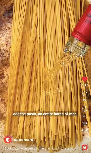 Image from Instagram of dried pasta going into a pot with browned butter and a bottle of white wine. The text reads “add the pasta, an entire bottle of wine”. Feel from nytcooking