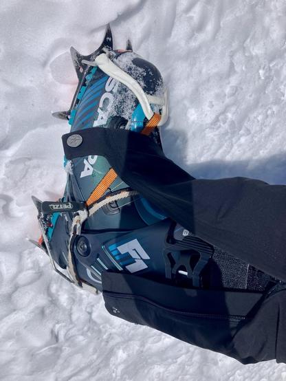 A scarpa touring ski boot with very spiky crampons