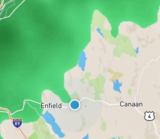 Green blob overlaid on NH map where rain is showing up on radar, it is moving NNE. There's a blue dot showing our merry band of bikers (ok, kid wasn't so merry) and oddly there's a long finger of green rain is extending from the larger storm to poke us.