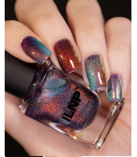 magnetic glittery nail polish in holographic red-teal-purple