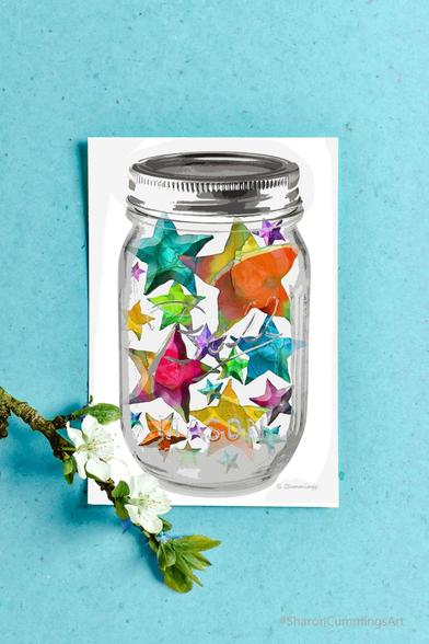 Colorful stars in a mason jar on crisp white by artist Sharon Cummings.