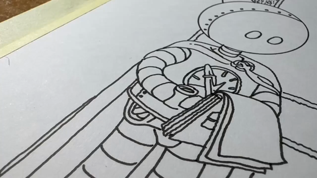 Scroll over a drawing being inked,showing a bubbleheaded robot taking notes on a sketchbook and the long side strip of a tapestry with intricate floral design.