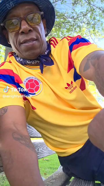 National Treasure and all round good egg Ian Wright Wright Wright sat in a park on a bench on a lovely day wearing a yellow Adidas football shirt, bucket hat and glasses, looking miffed, as well he should. What a shitshow.