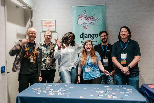 Group photo at the Django table during DjangoCon US 2025